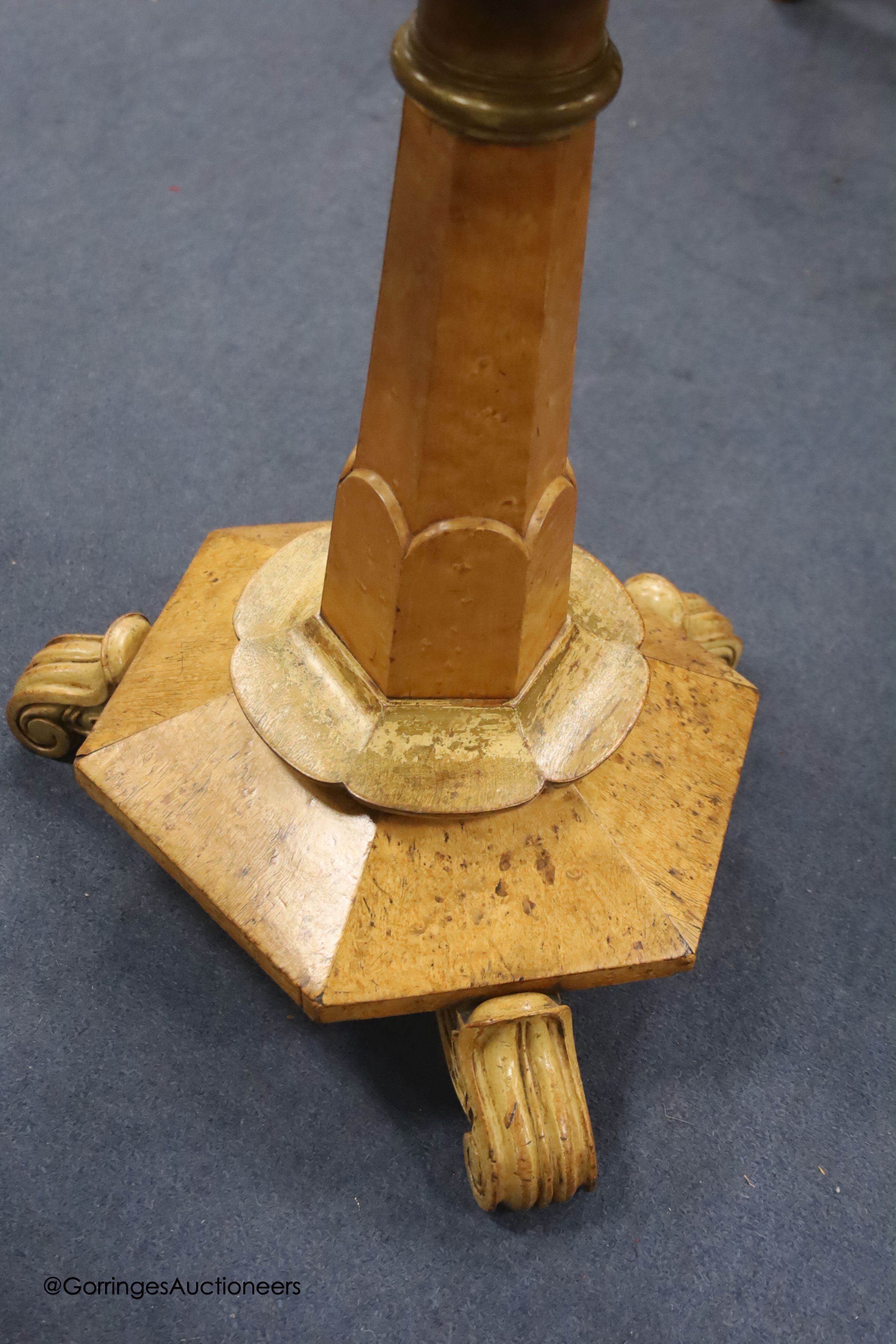 A 19th century bird's eye maple cane seated dressing stool